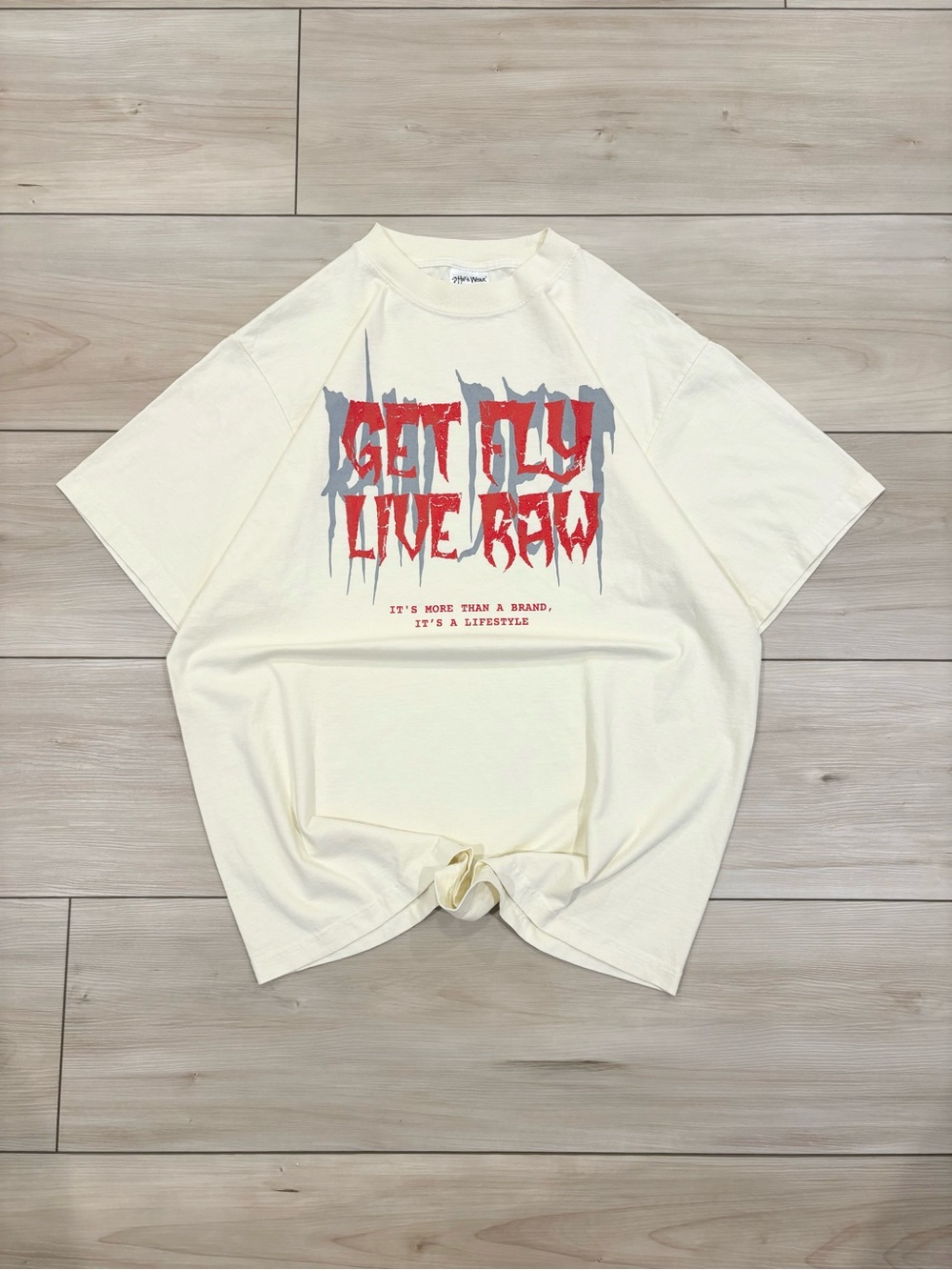Shaka Wear 2000s Get Fly Live Raw Mens Graphic Tee - Cream with Red Print